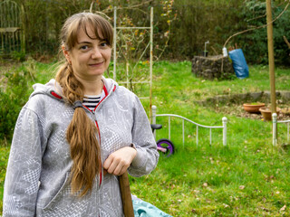 The cheerful mature woman smiled at the photographer.