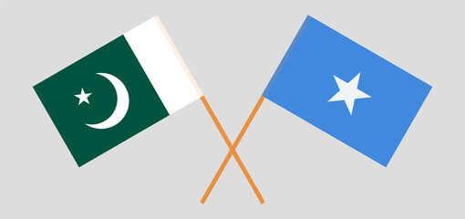 Crossed flags of Pakistan and Somalia. Official colors. Correct proportion