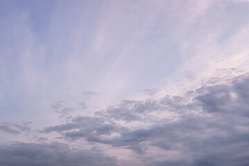 Naklejka na ściany i meble dramatic cloudy sunset sky blue hour background