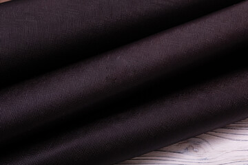 Natural folded dark brown cow leather	
