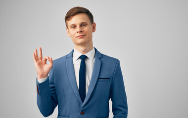 Man blue jacket tie manager official Professional gray background