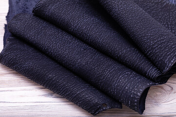 Natural folded spotty blue cow leather