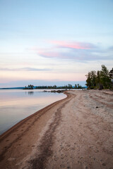 Sandy shore along the lake. Evening landscape.Kola Peninsula Tersky District lake kolvitsa