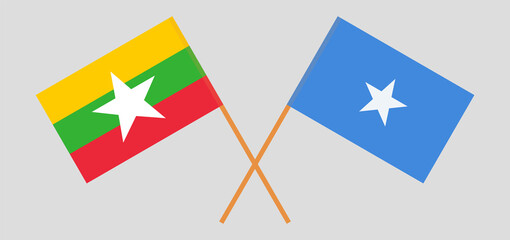 Crossed flags of Myanmar and Somalia. Official colors. Correct proportion
