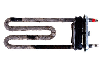 Defective tubular electric heater from a washing machine covered with limescale from hard water