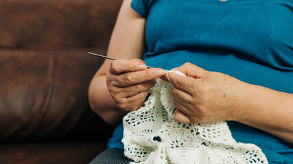 detail plans of latin woman weaving for her home