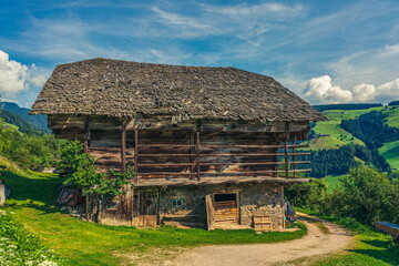 Fototapeta na wymiar Old wooden hut in the Dolomites, Italy.