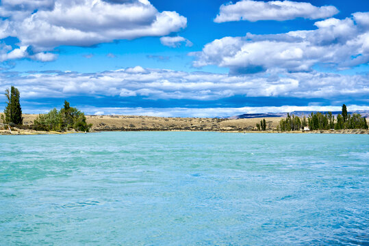 Argentina, Santa Cruz. Driving the RN40 National Route between Viedma and Argentine lakes, La Leona River flowing between the two lakes.