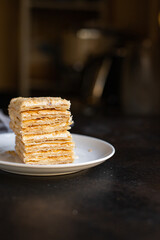 mille feuille cake layers cream napoleon dessert sweet piece top view copy space for text food background rustic image