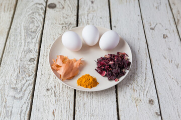  Ingredients for home coloring Easter eggs with eco-friendly dyes, hibiscus tea, egg husks, turmeric