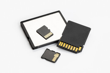 Group of memory cards on white table