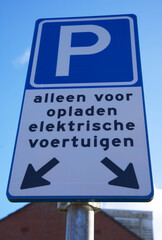 Dutch traffic sign saying: parking for charing electrical vehicles only