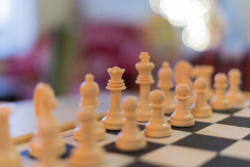 Chess pieces set on a chessboard