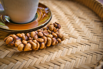 Musk has a coffee mug placed on a rattan