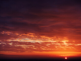 Dramatic sunset sky - with sun