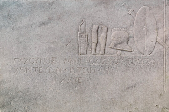 fragment of an ancient Greek marble tombstone on the grave of an archon in the 1-200 A.D. from Chersonesos, Crimea