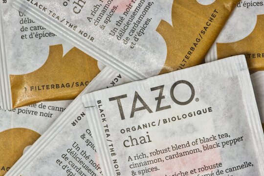 Tazo chai flavor tea bag square packets scattered loosely macro Houston Texas USA 02-25-2021.