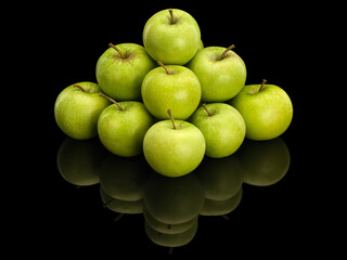 Pyramid from fruits of green apples