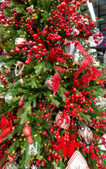 Cranberry and various decorations on a Christmas tree