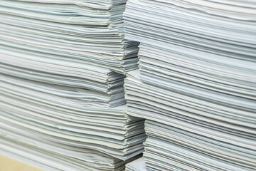 pile of paper documents in the office. waste paper, paper trash
