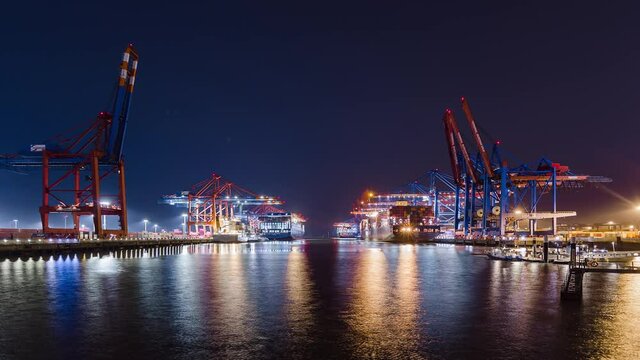 Container ship loading and unloading in deep sea port, Low angle View of business logistic import and export freight transportation by container ship, Container loading cargo freight ship, Time Lapse
