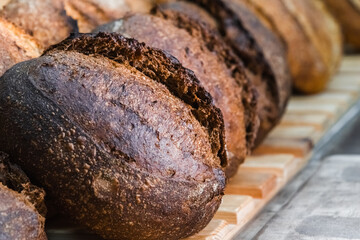 Craft bread on the table at the bakery. The concept of small industries and healthy food