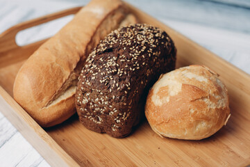 bread whole grain homemade cakes wooden tray breakfast