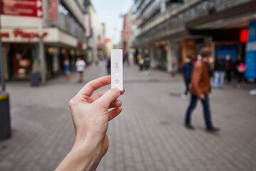 Covid rapid test and vaccination Corona measures Travel time city center pedestrian shopping