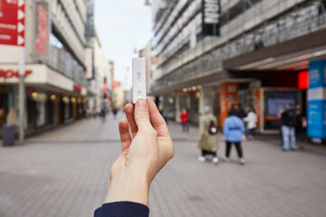 Covid rapid test and vaccination Corona measures Travel time city center pedestrian shopping