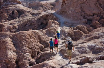 Tourists hiking in Valle de la Luna (Moon Valley), San Pedro de Atacama, Antofagasta Region, Chile