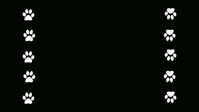 Frame paw prints of animal on a black background. An abstract backdrop for the writing of the text.