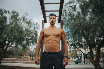 young man exercises with face mask outdoors