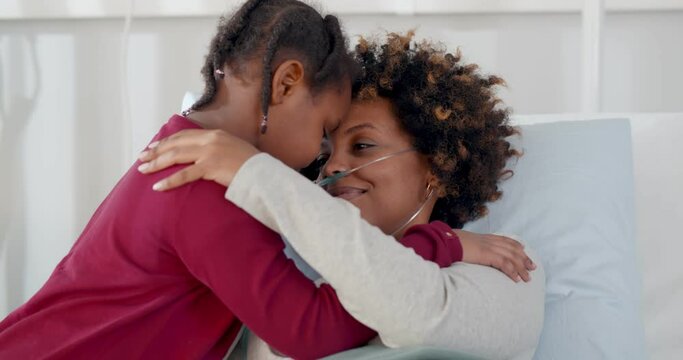 Cute african daughter visiting sick mother in hospital and hugging