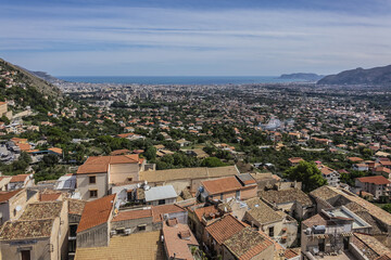 Fototapeta na wymiar Aerial view of Monreale city from Cathedral of Monreale. Monreale - town and commune in the Metropolitan City of Palermo. Sicily, Italy, Europe.
