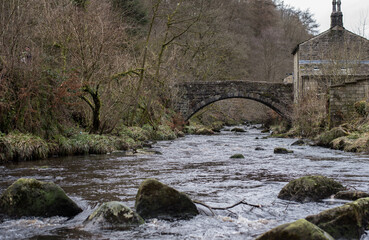 The Hebden Beck river and 19th-century bridge. Gibson Mill, Hardcastle Crags, United Kingdom. 
