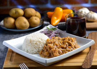 Teasty Peruvian food Carapulcra made with dry potatoes saute with chiken pork spices and red hot...