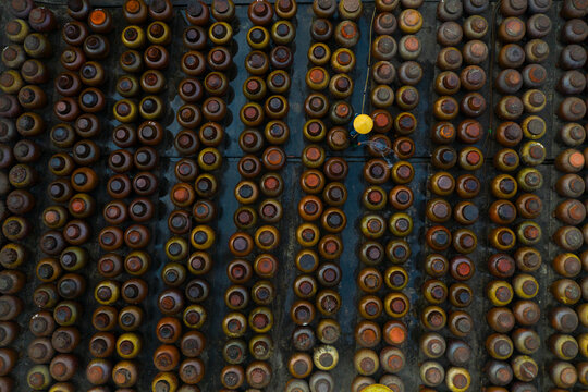 Aerial view of soya sauce barrels while processing in a factory in Huyện Mỹ H&agrave;o, Hung Yen province, Vietnam.