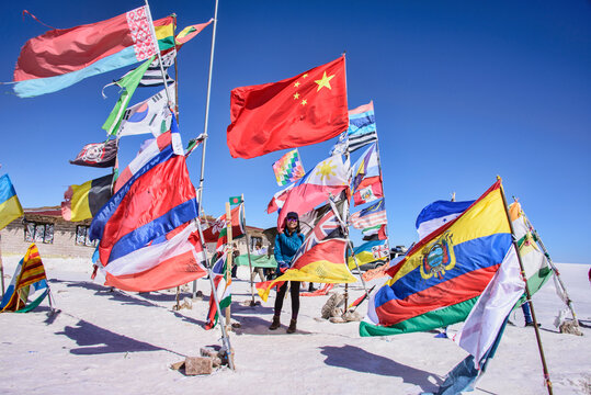 Flags around the world on the vast salt flats of Salar de Uyuni, Bolivia