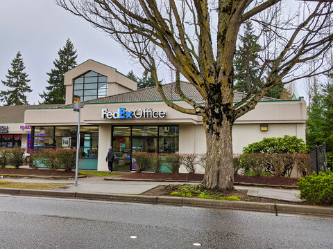 Bellevue, WA / USA - circa January 2020: Exterior of a FedEx post office store front in the Bellevue - Remond area near the Crossroads Bellevue shopping center.