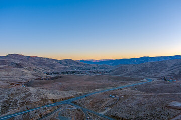 Aerial view of Pleasant Valley Nevada between Carson City and Reno, as seen from south towards north with Highway 395 and I-580 with the Galena arch bridge.