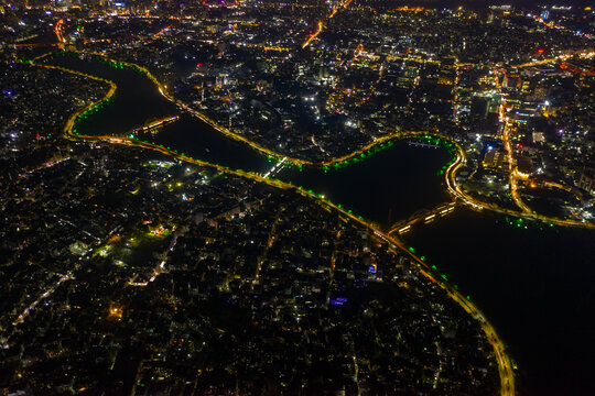 Aerial view of Dhaka cityscape and Gulshan lake at night, Dhaka, Bangladesh.