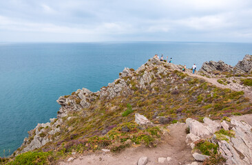 Fototapeta na wymiar Cliffs at Erquy Cape in Brittany in Northwestern of France