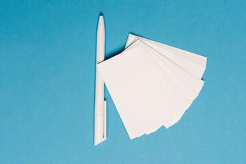 blank business cards on blue background mockup Copy space