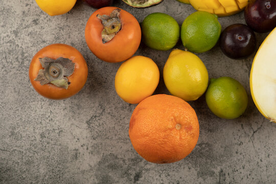 Bunch of fresh whole fruit composition on marble surface © azerbaijan-stockers