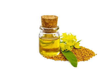 Oil mustard in vial with seeds and flower