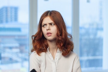 pretty female manager in professional office work