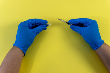 Flat Lay for medical theme and vaccinations from COVID-19. Medicine, vaccine, hands of a doctor