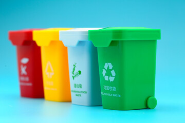 colorful trash sorting can  on blue background