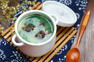 sea cucumber congee soup in white pot