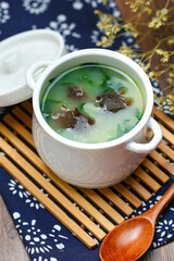 sea cucumber congee soup in white pot